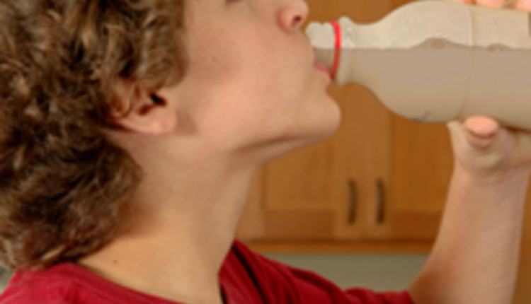 Student drinking chocolate milk