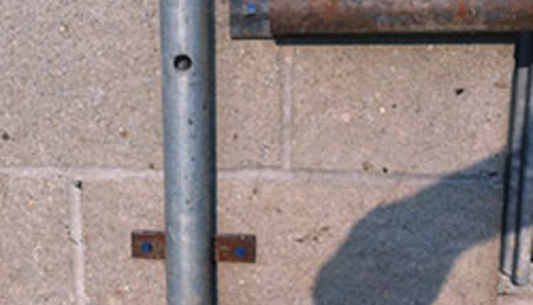 keeps water tank hose in place